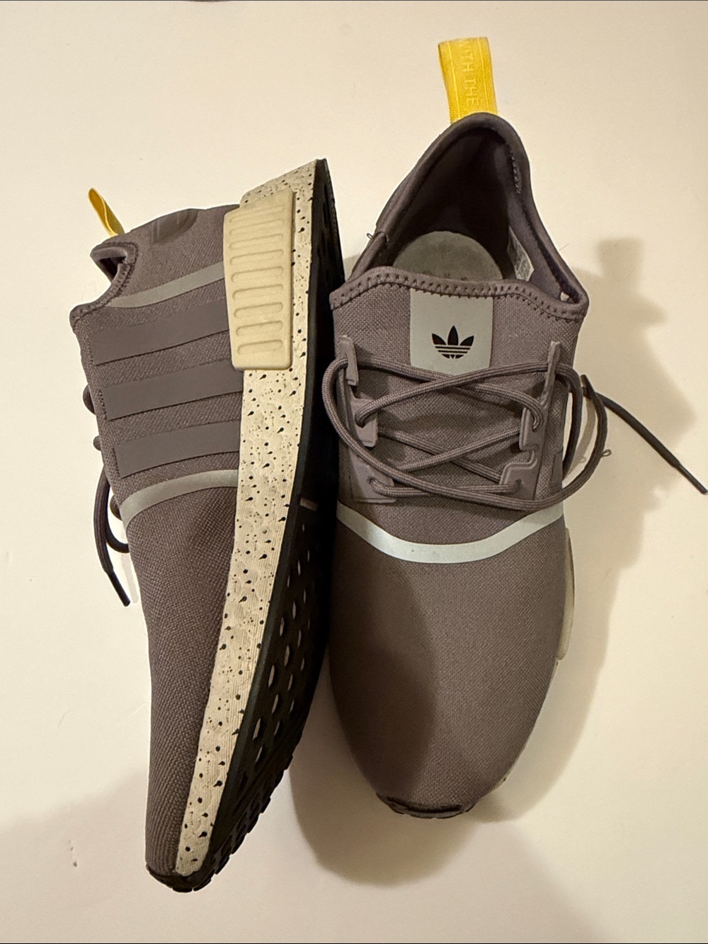 adidas NMD_R1 Men’s Gray Knit Sneakers with Yellow Heel Tabs